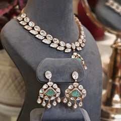 Aaravali mint green moissanite stone set