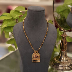Narmada golden pendent set