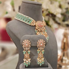Aaryash Pink and mint green Polki Set
