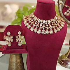 Aadesh Polki Neckline Set