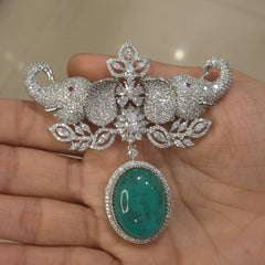 Pal Ad brooch