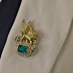 King Ad brooch