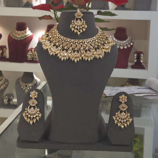 Roshni gold coloured set