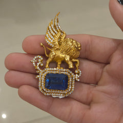 King Ad brooch