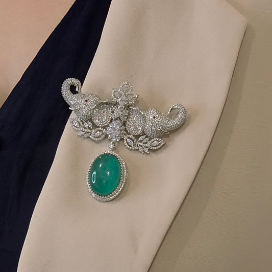 Pal Ad brooch