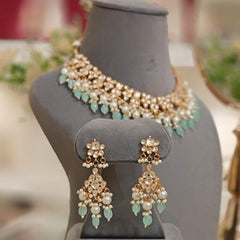Anika mint green Kundan Set