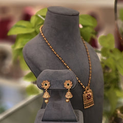 Narmada golden pendent set