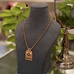 Narmada golden pendent set