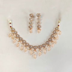 Azeen peach green Polki Set
