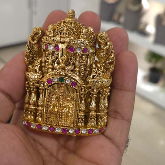 Lord Ganesha temple coin sindoor dibiaa