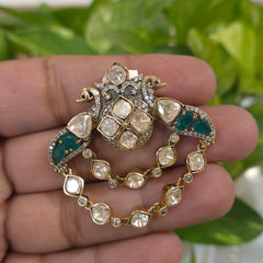 The two peacocks brooch