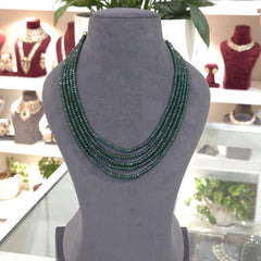 Emerald coloured stones strand