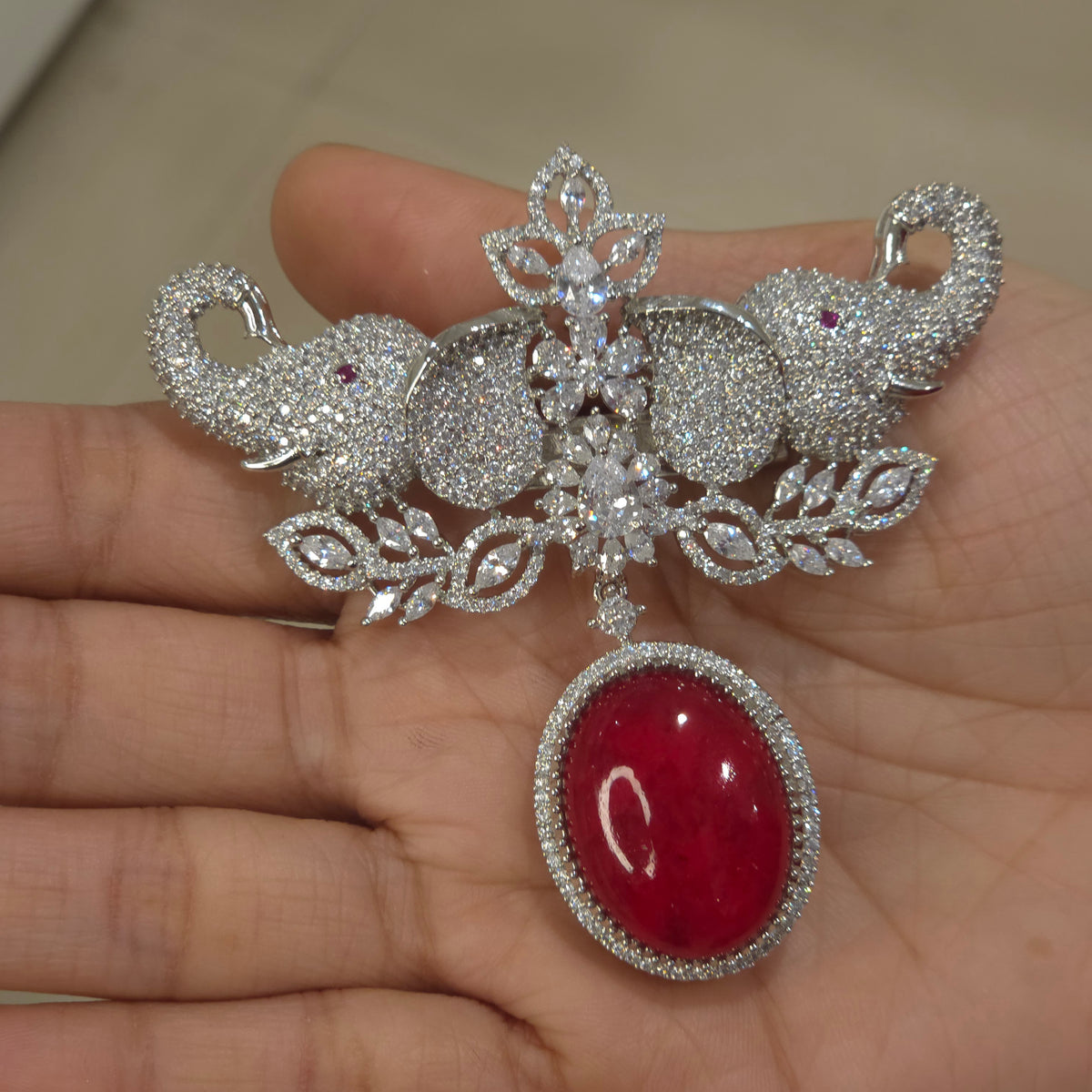 Pal Ad brooch