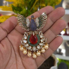 Dancing peacock brooch