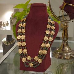 Nivedita moissanite polki set .