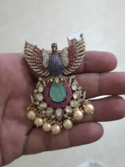 Dancing peacock brooch