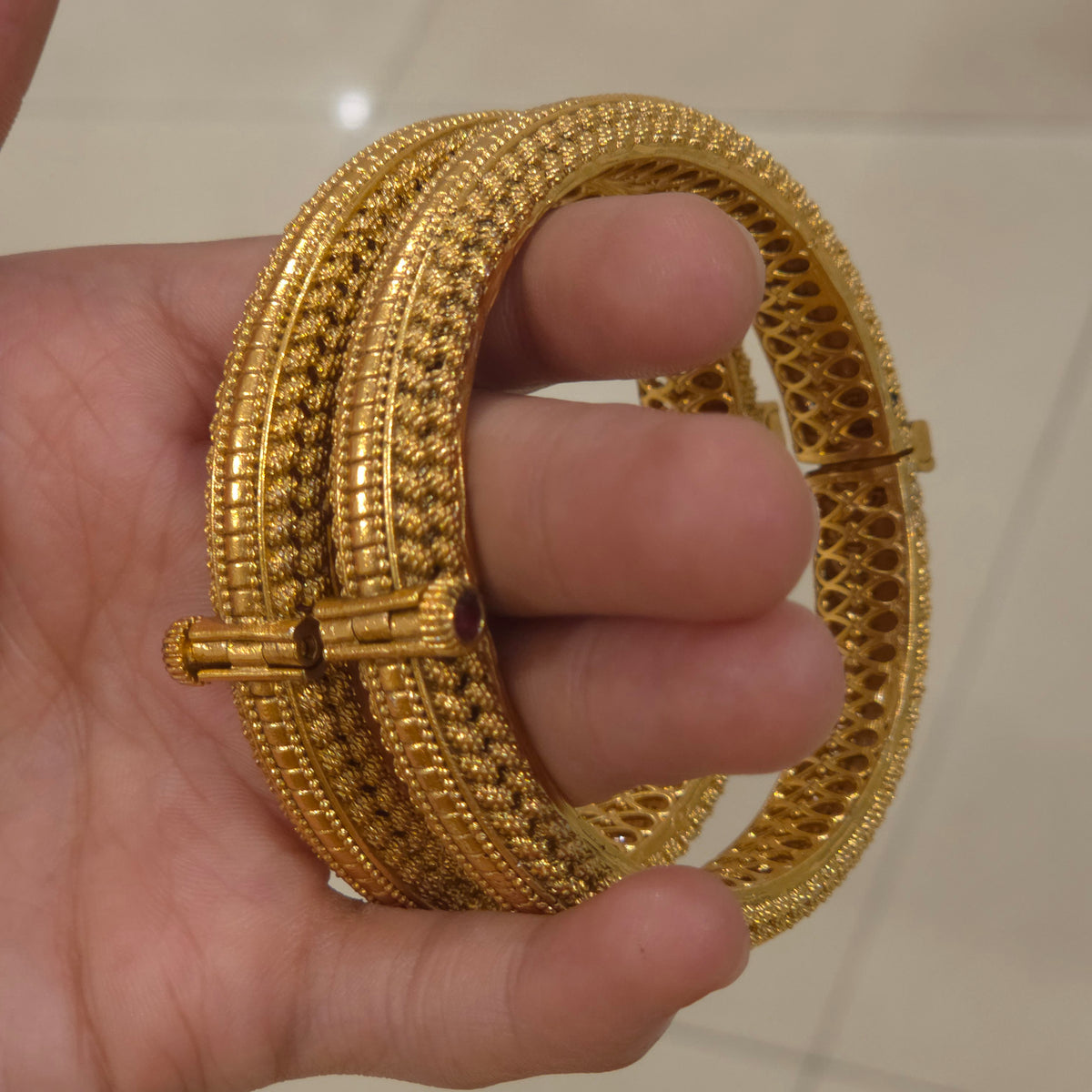 Nidhi antique gold bangles